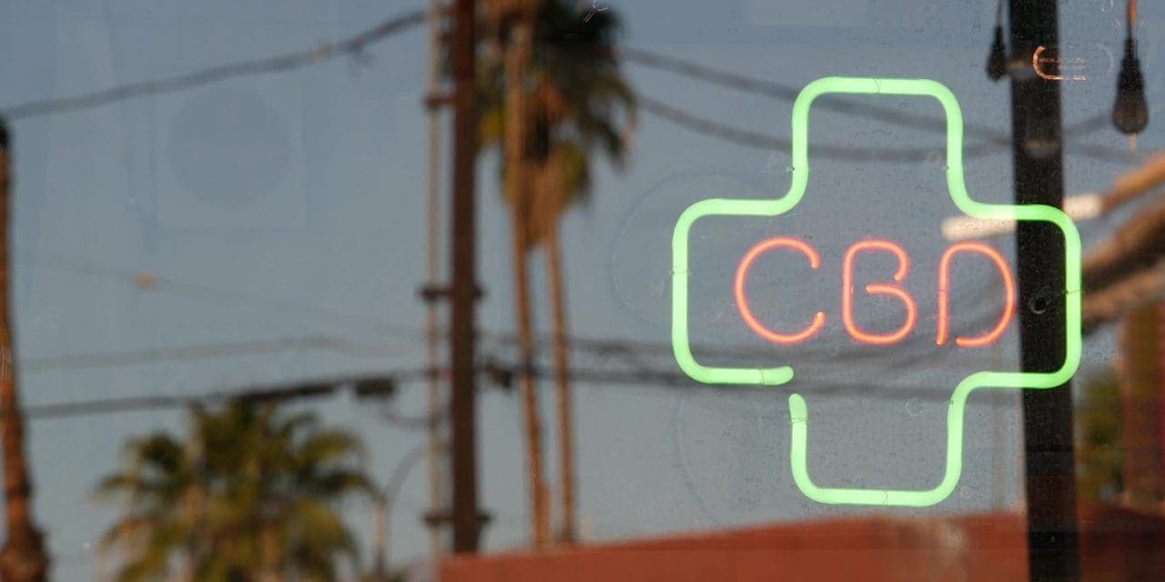 CBD in medical cross neon sign